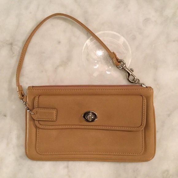 Coach Handbags - Tan Coach Leather Gallery Large Wristlet.